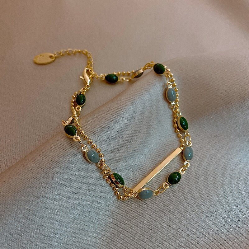 Pulsera Doble Con Encanto