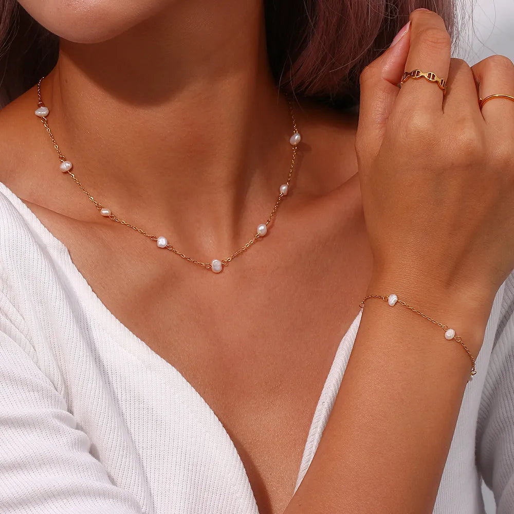 Conjunto de Collar y Pulsera de Perlas en Acero Inoxidable