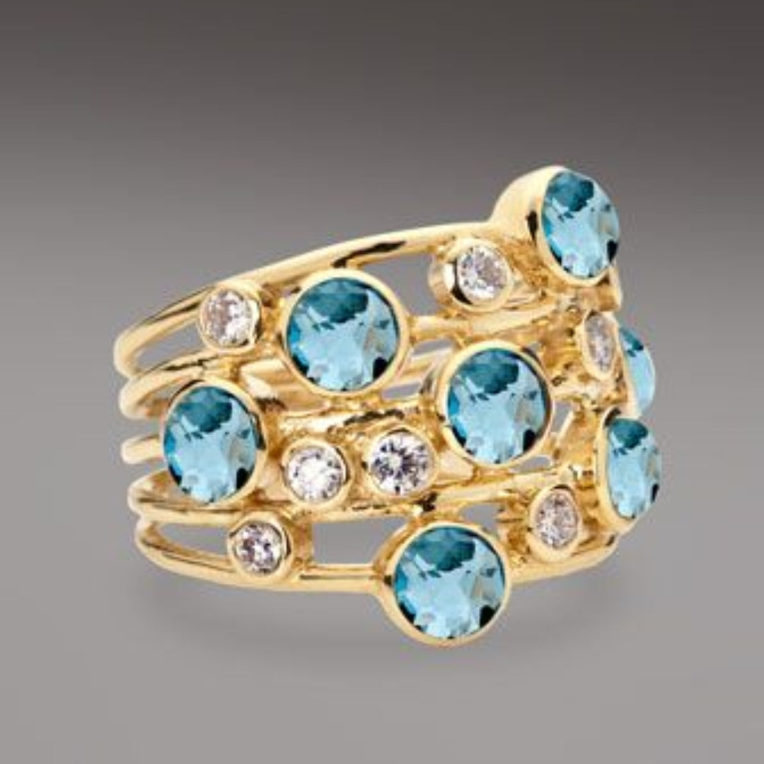 Anillo Vintage de Oro con Múltiples Zirconias Azules y Blancas