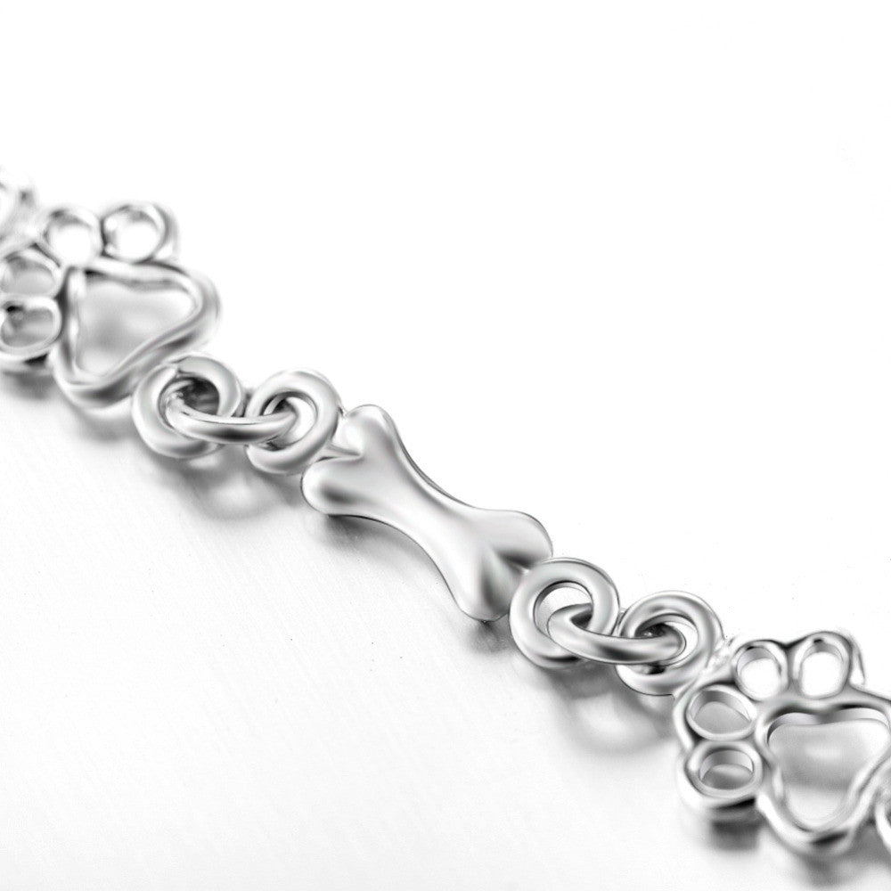 Pulsera con Charms de Huella de Perro y Hueso en Plata Pura, Edición Limitada