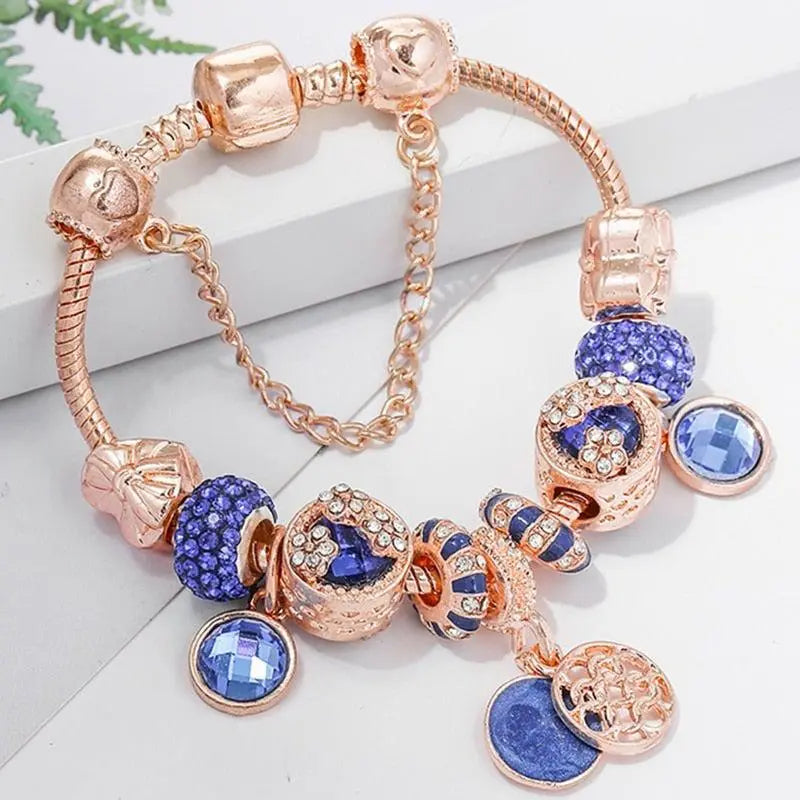 Pulsera de Cristal Azul y Oro Rosa