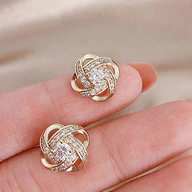 Pendientes en Forma de Cruz con Flor Espiral