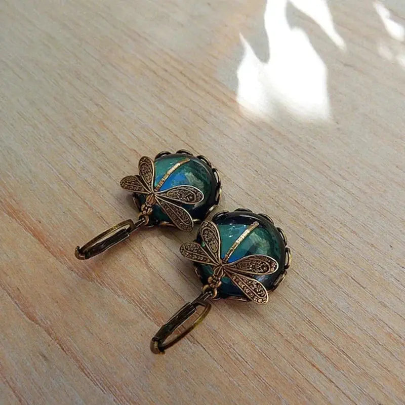 Pendientes Esfera Libélula en Oro Antiguo