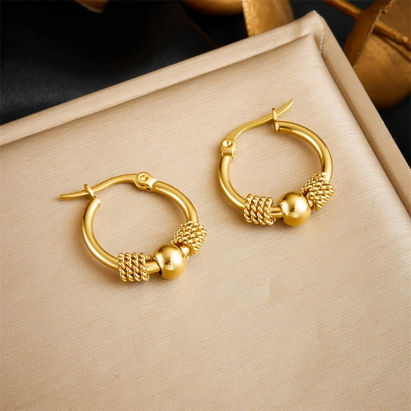 Pendientes de aro con cuentas de oro