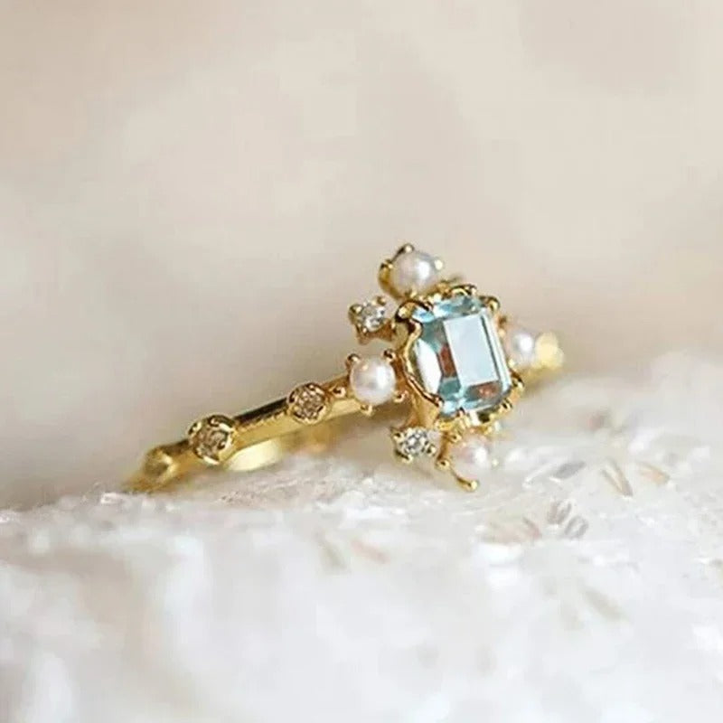 Anillo vintage con perla azul cielo