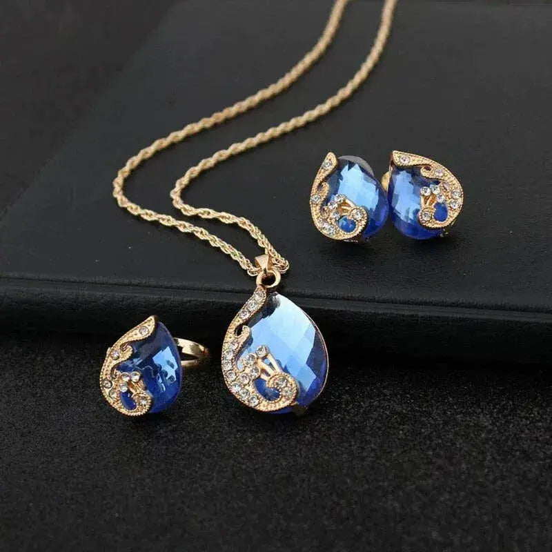 Conjunto de Collar y Pendientes de Cristal Azul con Oro