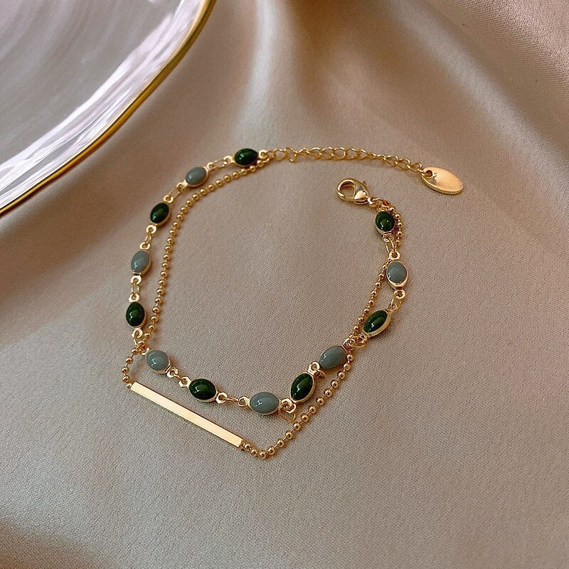 Pulsera Doble Con Encanto