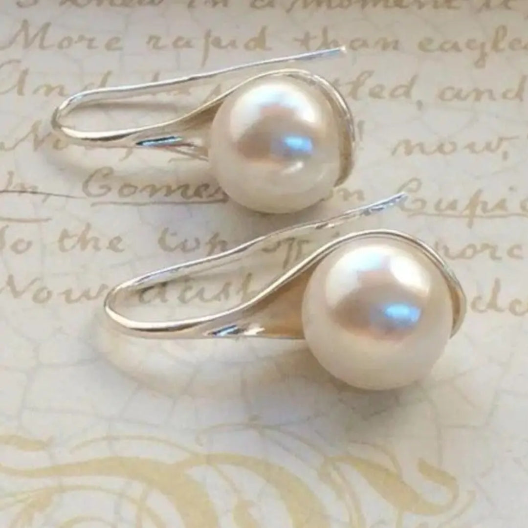 Pendientes elegantes con perlas en forma de lágrima
