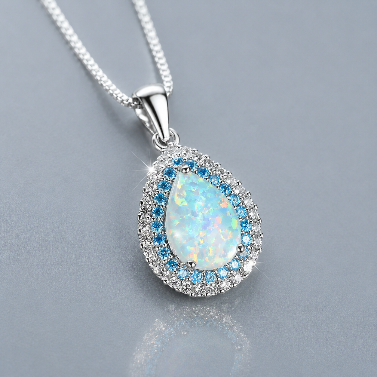 Elegante collar colgante de ópalo azul brillante | Oro blanco