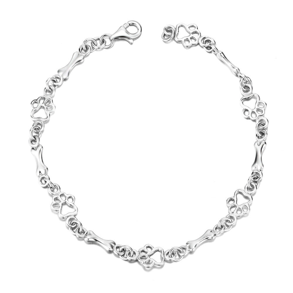 Pulsera con Charms de Huella de Perro y Hueso en Plata Pura, Edición Limitada
