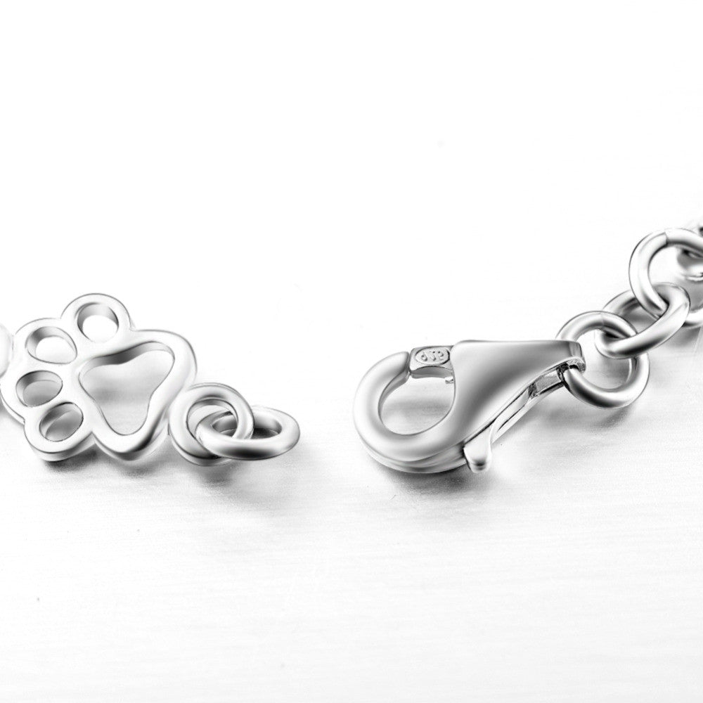 Pulsera con Charms de Huella de Perro y Hueso en Plata Pura, Edición Limitada