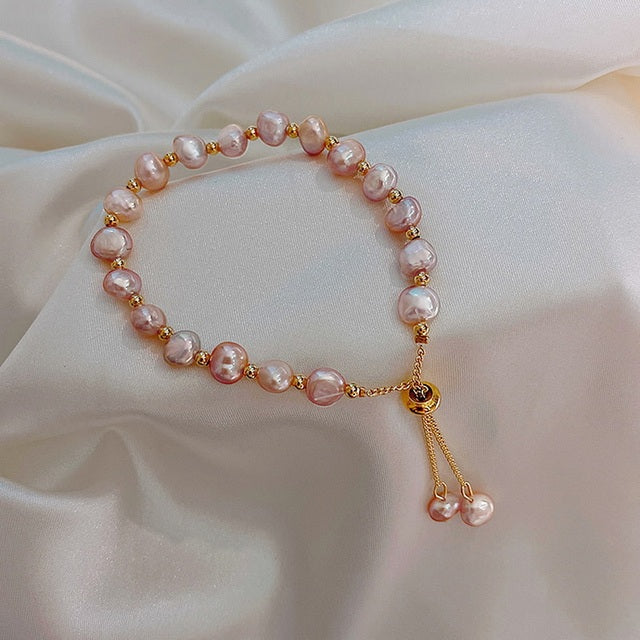 Pulsera de Perlas Rosadas en Oro