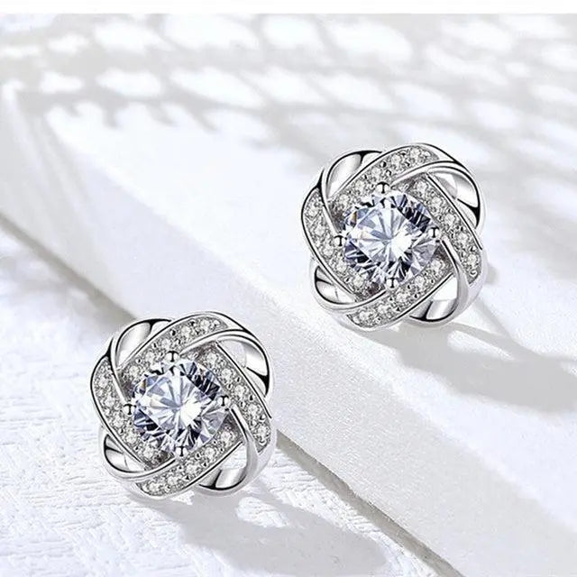 Pendientes en Forma de Cruz con Flor Espiral