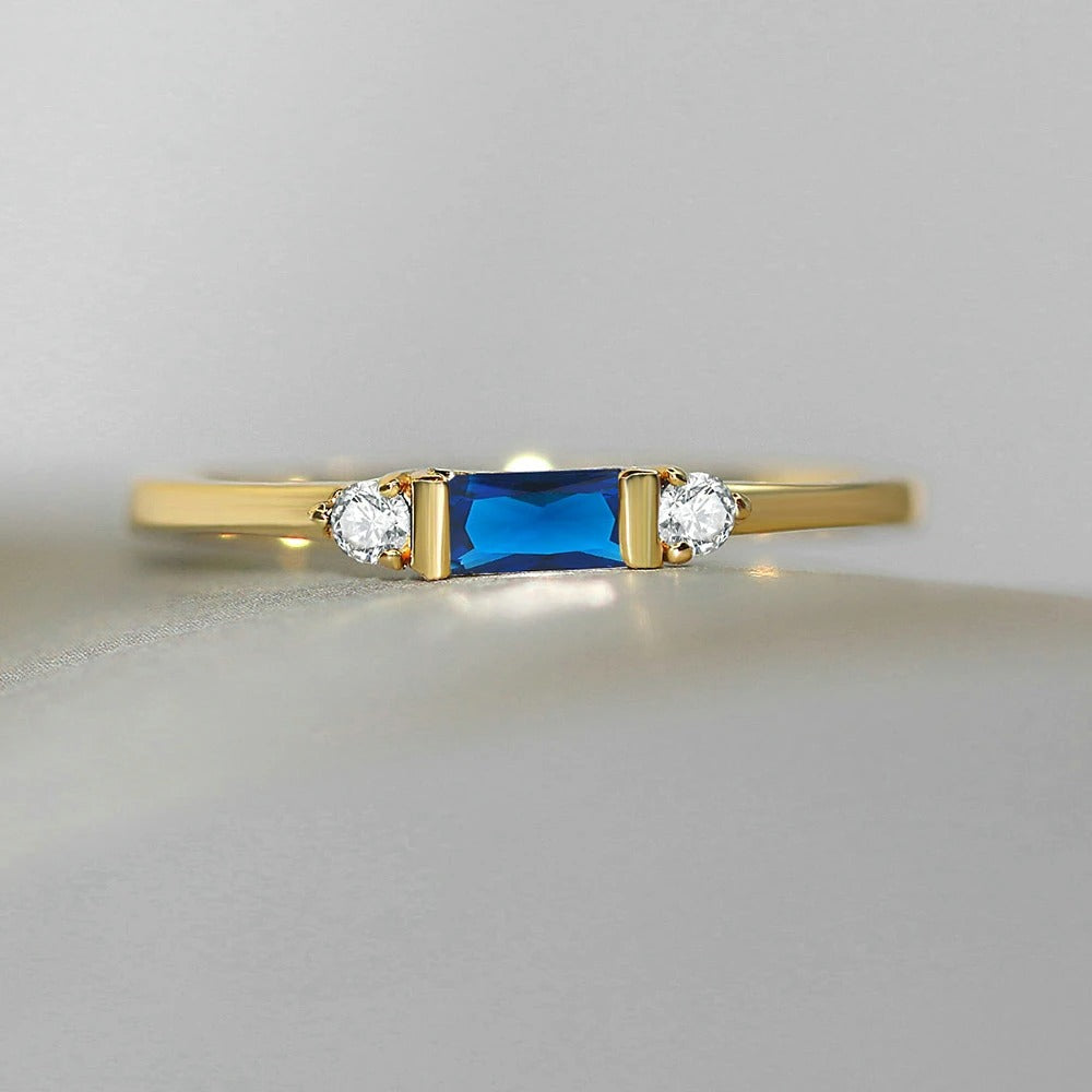 Impresionante Anillo de Centro Dorado Azul y Brillante