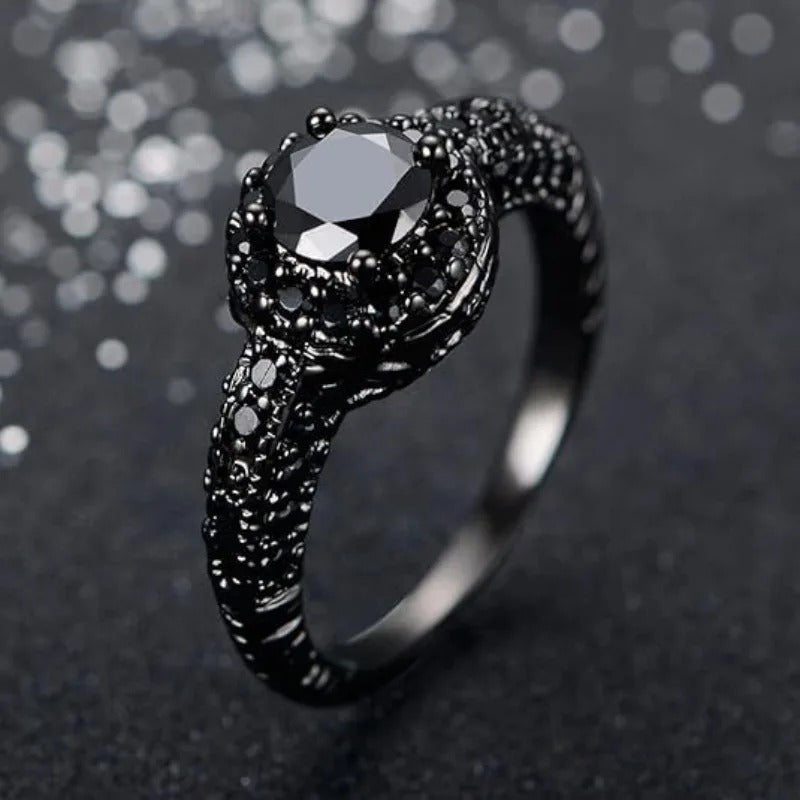 Anillo de cobre vintage con piedra negra